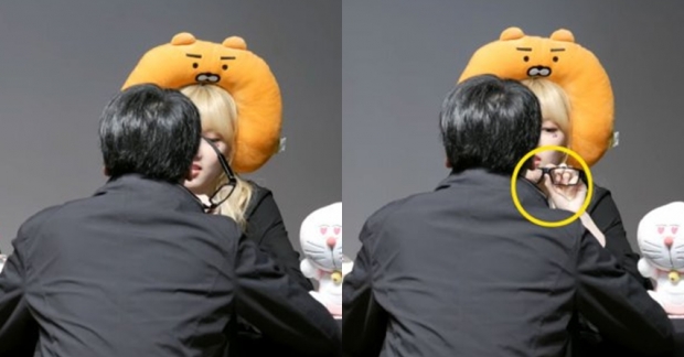 Một fan nam đeo k&iacute;nh c&oacute; gắn camera b&iacute; mật quay lại h&igrave;nh ảnh của G-Friend