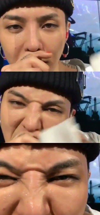 Bài báo: G-Dragon eye contact với fan lau mồ hôi cho anh 