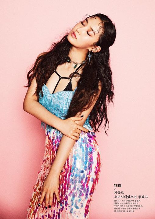 SNSD Yuri trong loạt ảnh teaser của "Holiday Night". Nhóm xác nhận sẽ phát hành digital vào 4/8, trước khi tổ chức fanmeeting vào 5/8 và bán album vào 7/8. 